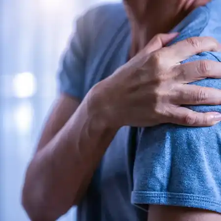 Sharp or dull pain in the shoulder joint